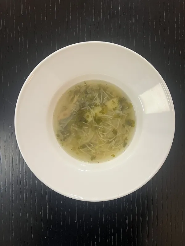 A pot of cholent with meat, beans, potatoes, and barley