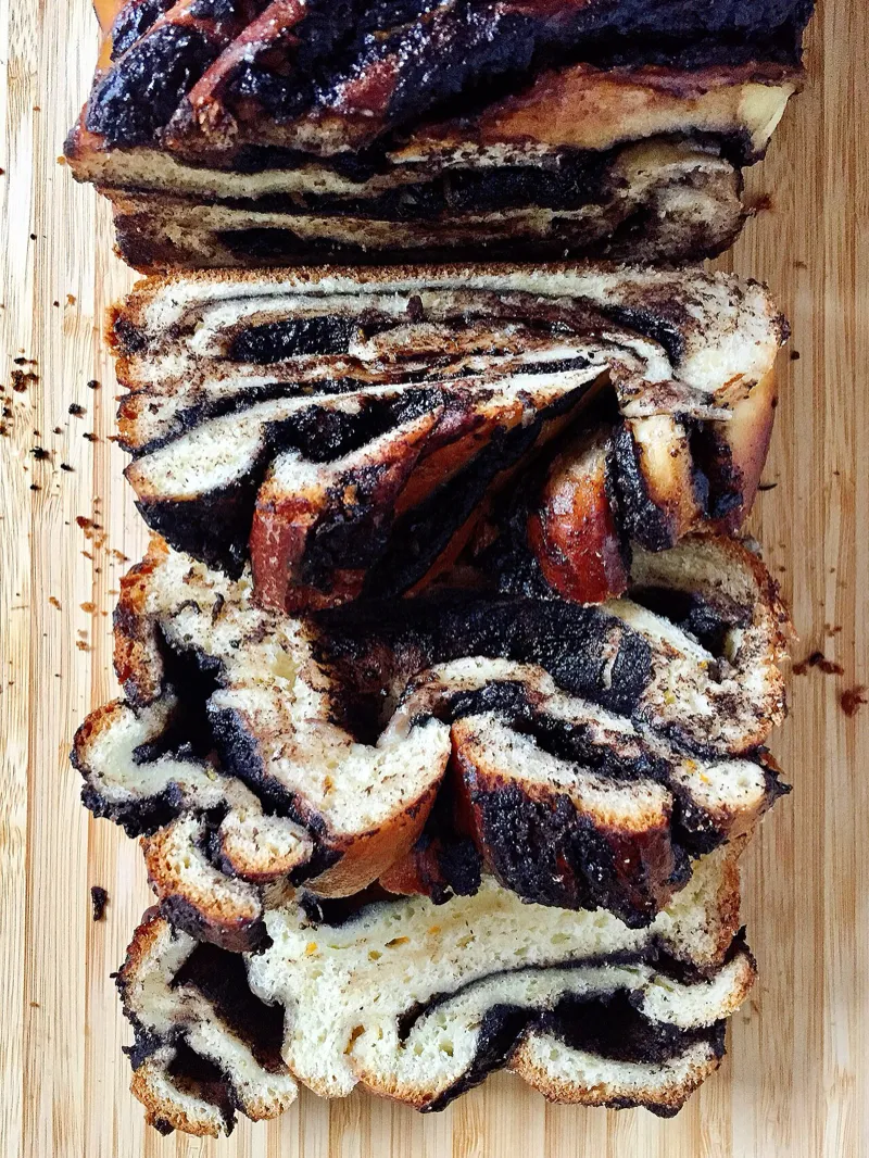 Sliced chocolate babka showing the swirled layers of dough and filling