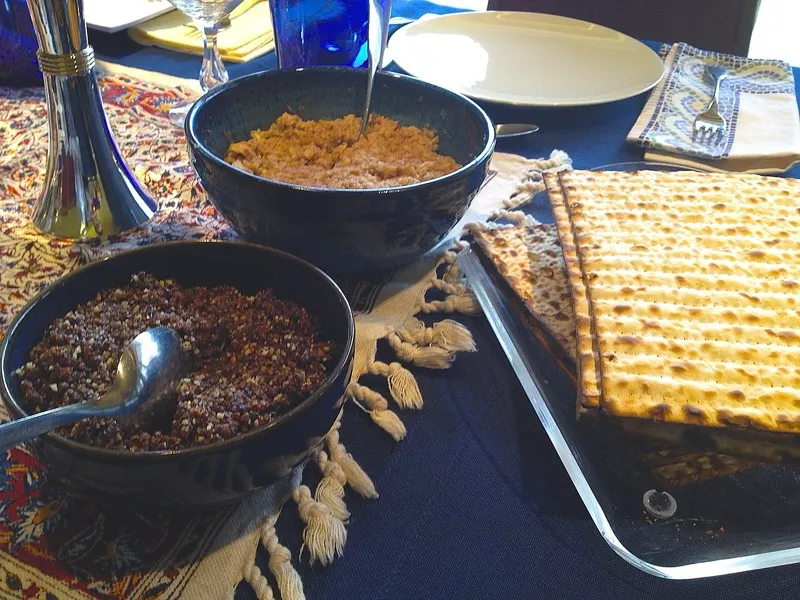 Bowl of charoset made with apples, walnuts, and wine