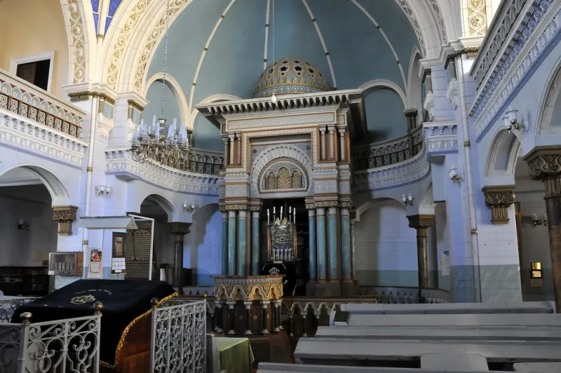 Diverse Jewish worshippers representing different denominations in a synagogue