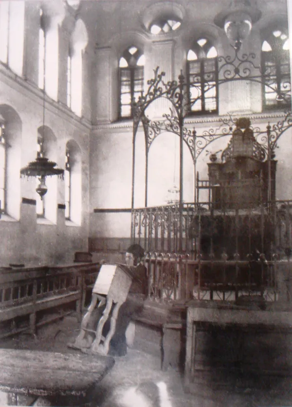Interior of an Orthodox synagogue in Jerusalem with ornate Torah ark