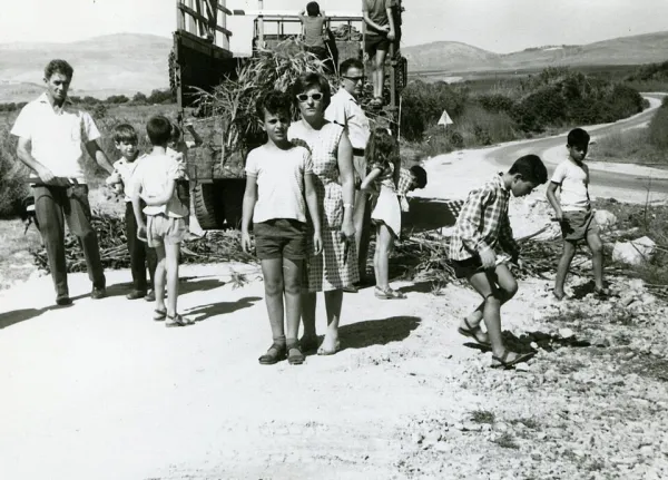 Sukkah frame being assembled with wooden beams