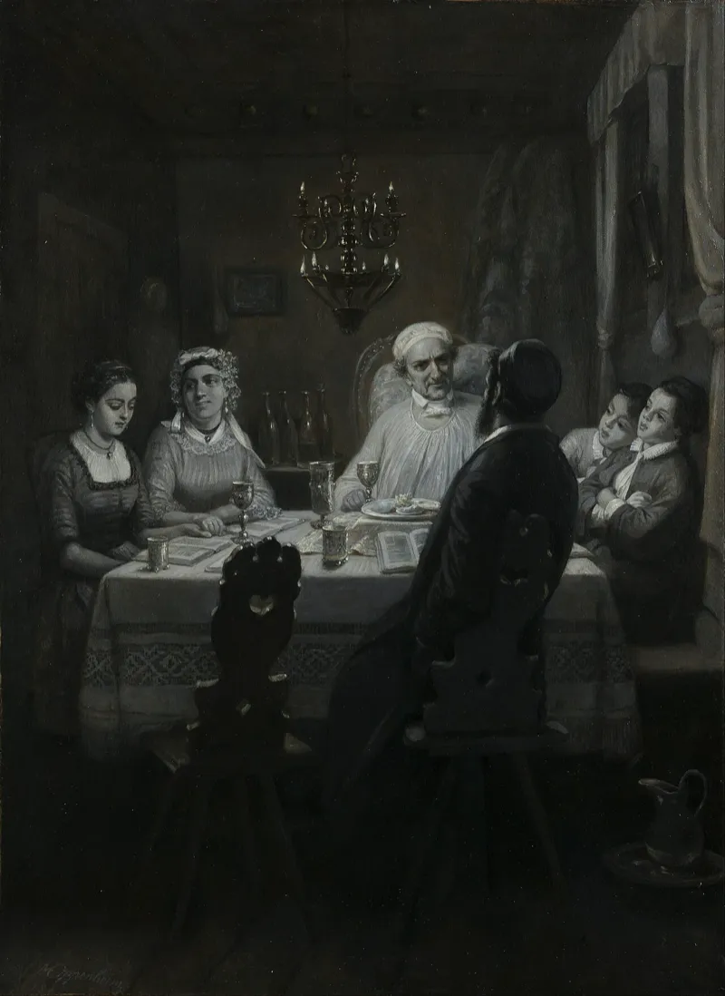 A diverse group of people gathered around a Passover seder table