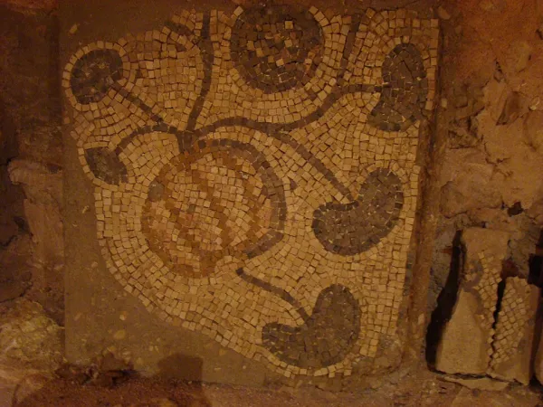The Beit Alpha synagogue zodiac mosaic showing twelve signs with Hebrew labels
