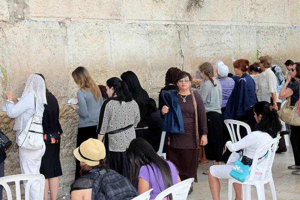 Women studying Talmud together in a modern setting