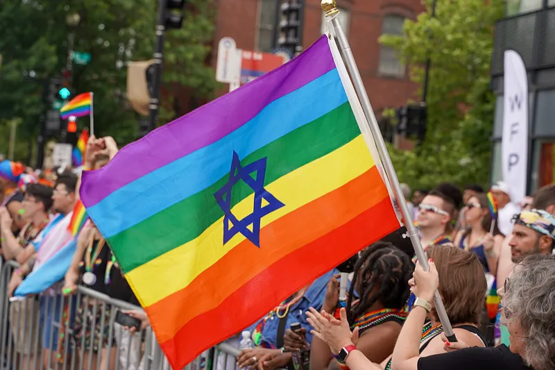 A rainbow flag displayed at a synagogue celebrating Pride and Jewish inclusion