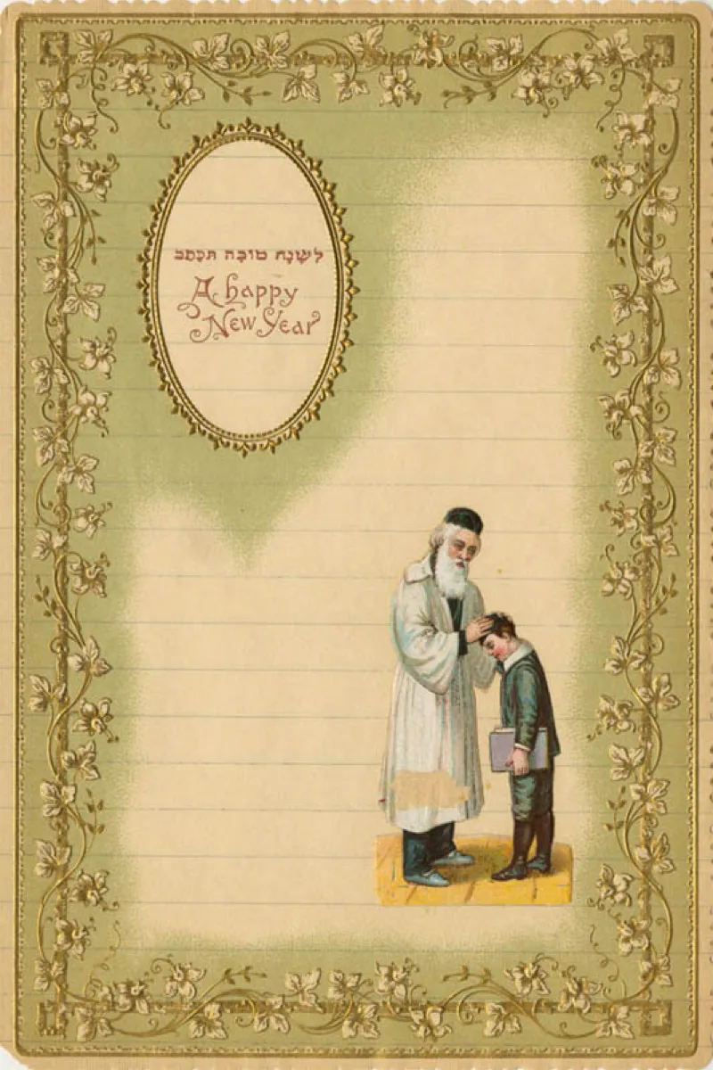 Shofar and pomegranate on a white tablecloth