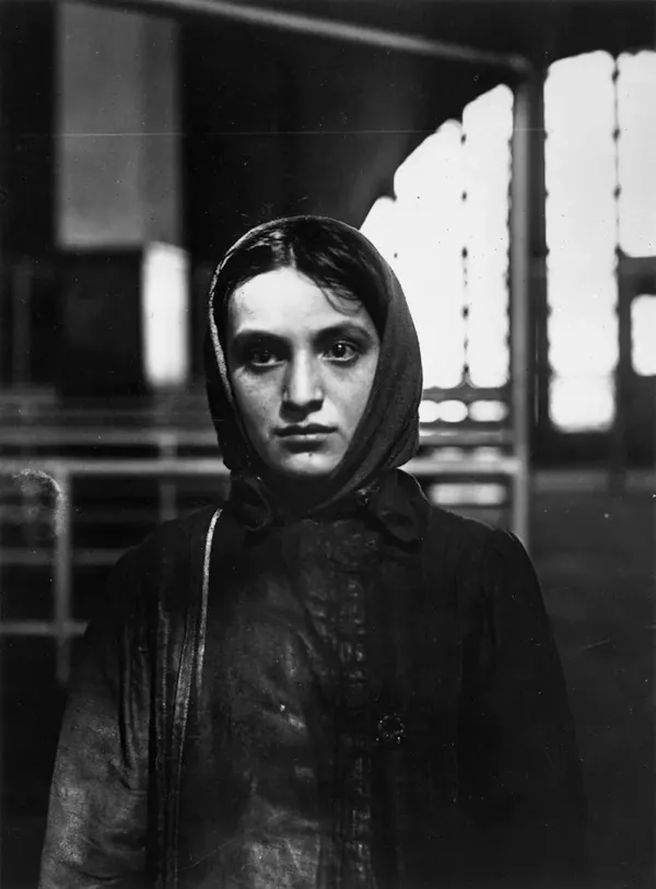 A Russian Jewish girl photographed at Ellis Island in 1905 by Lewis Hine