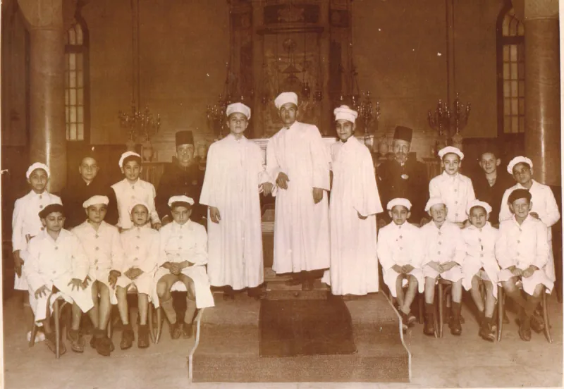 A synagogue choir led by a rabbi during prayer services in Alexandria