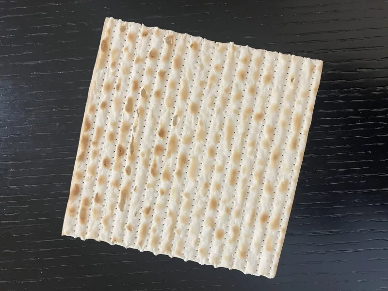 Matzah brei — broken matzah fried with eggs, a beloved Passover breakfast