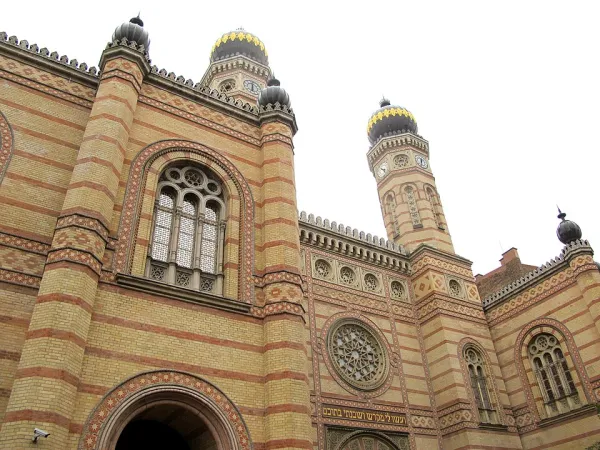 The colorful tiled interior of a historic North African synagogue