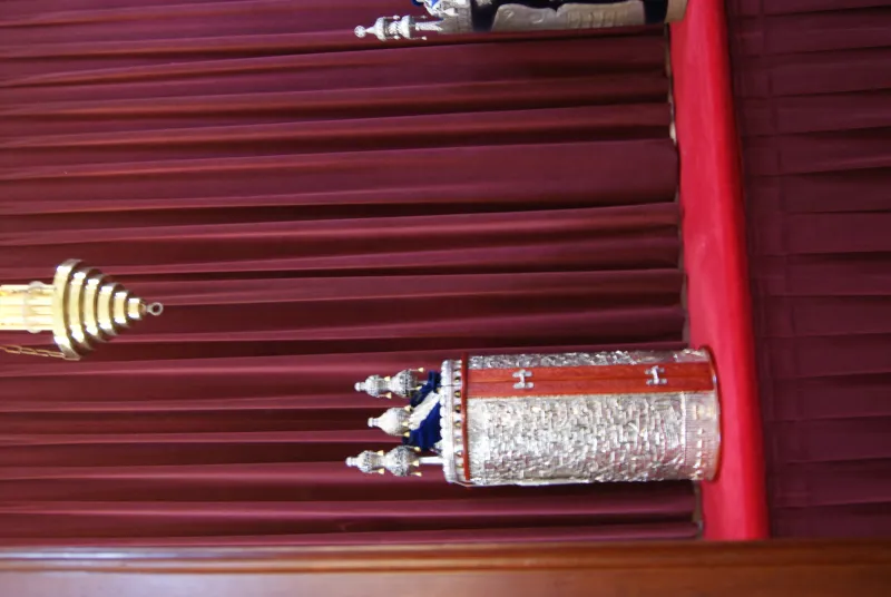 A Torah scroll open for reading in a synagogue