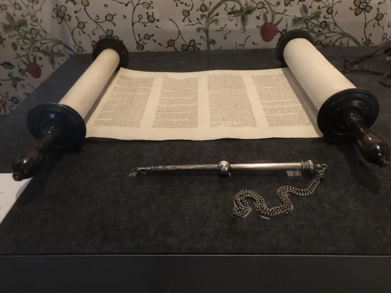 An open Torah scroll displayed for reading in a synagogue