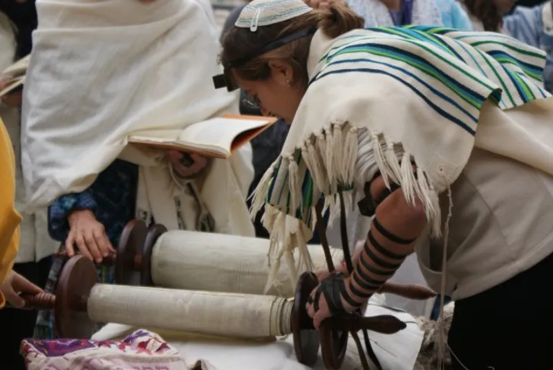 Open Torah scroll with yad pointer