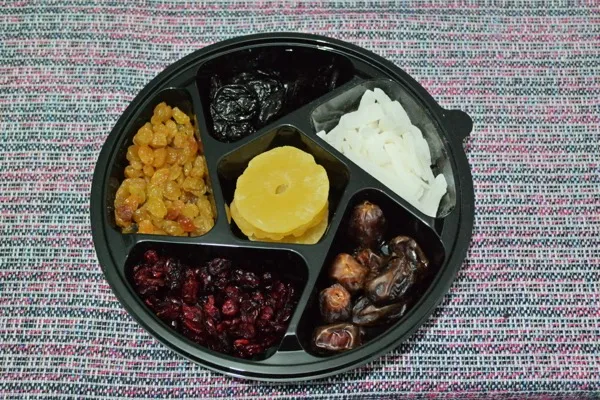 A prepackaged set of dried fruits arranged for a Tu BiShvat seder