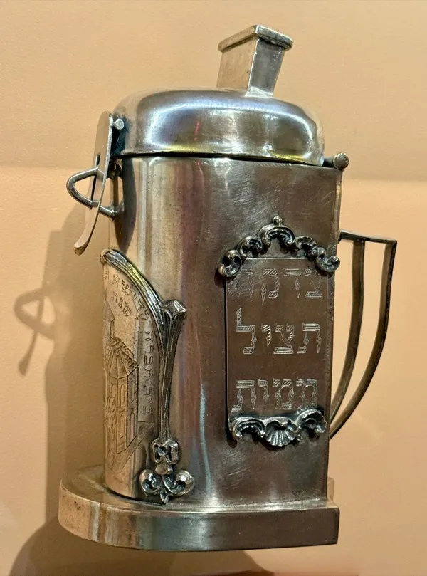 An antique silver charity box from Kiev, circa 1865, used for collecting tzedakah