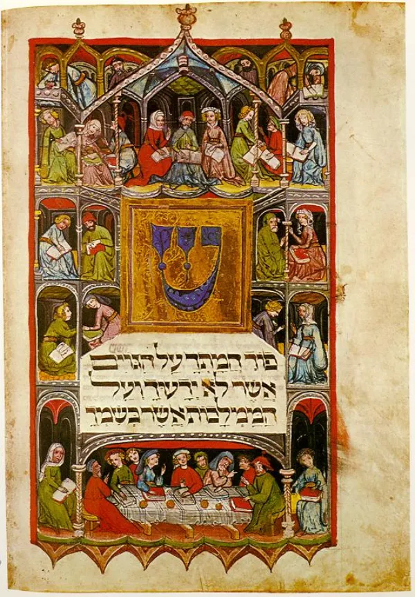 A family gathered around a seder table reading from the Haggadah
