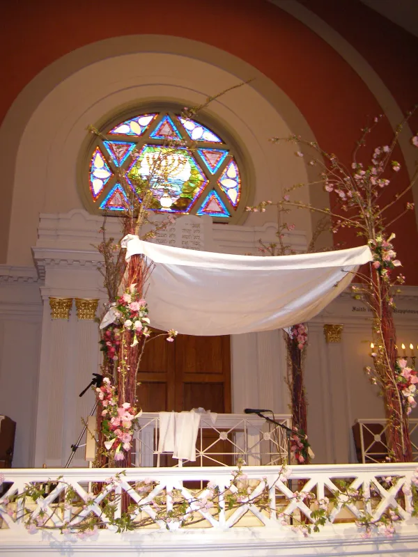 A closeup of a chuppah at a synagogue — the wedding canopy under which the glass-breaking ceremony takes place