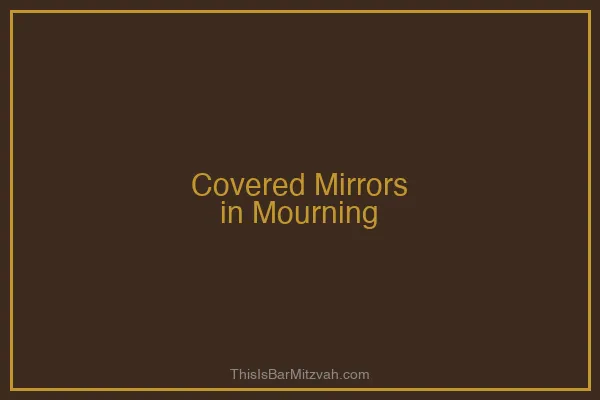 A shiva home with low chairs and covered mirrors reflecting the mourning period