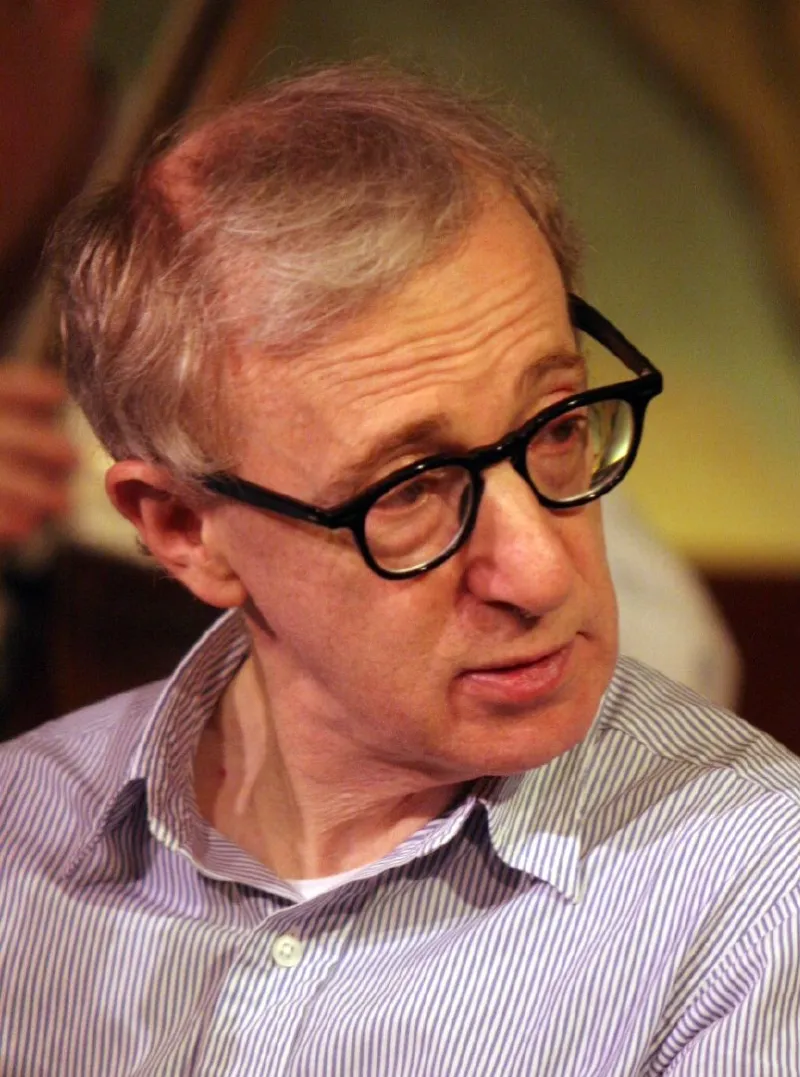 Woody Allen in his signature black-rimmed glasses